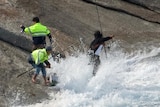 Wild waves wash onto fishermen at Salmon Holes