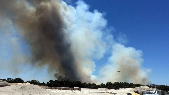 Smoke billows from a bushfire in Bullsbrook