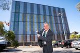 Edith Cowan University Vice-Chancellor, Professor Steve Chapman, in front of the giant periodic table