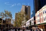 The word sorry sits in the air over the Sydney CBD in 2000.