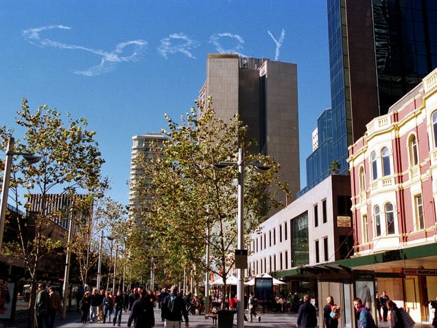 The word sorry sits in the air over the Sydney CBD in 2000.