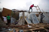 Residents repair their homes destroyed by Hurricane Matthew
