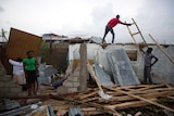 Residents repair their homes destroyed by Hurricane Matthew