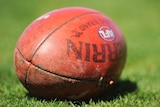 A football on the ground during Hawthorn Hawks' training session at Waverley Park in 2008.