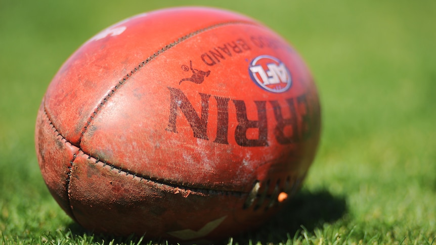 A football on the ground during Hawthorn Hawks' training session at Waverley Park in 2008.