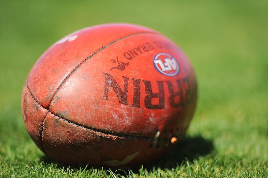 A football on the ground during Hawthorn Hawks' training session at Waverley Park in 2008.