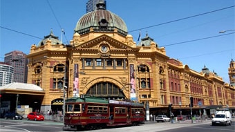 A tram outside Flinders St Station in Melbourne (ABC News)
