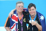 Father and son John and Danny Rumsey after the swimmer was awarded his medal for coming second in the 50 metre freestyle.