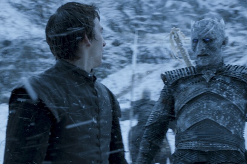 Bran turns to see the Night King standing near him in the snow.