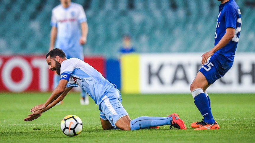 Alex Brosque goes down against Suwon