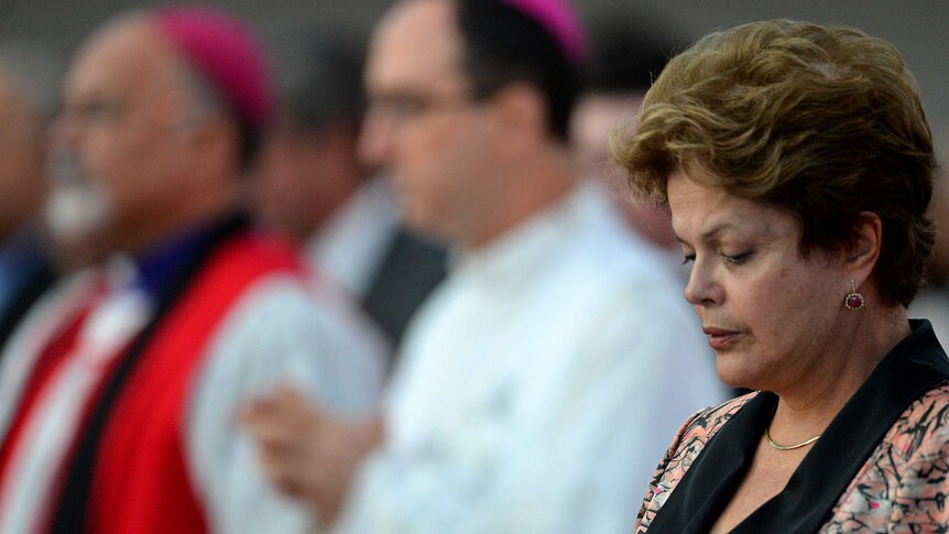Brazilian president Dilma Rousseff pays her respects at a memorial service for the 238 who died at a nightclub fire in Santa Maria.