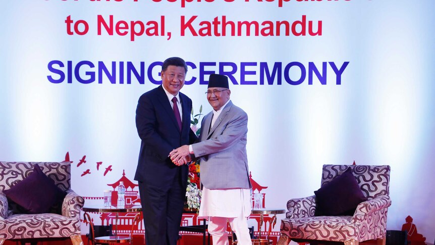 Chinese President Xi Jinping, left, and Nepalese Prime Minister Khadga Prasad Oli meet.