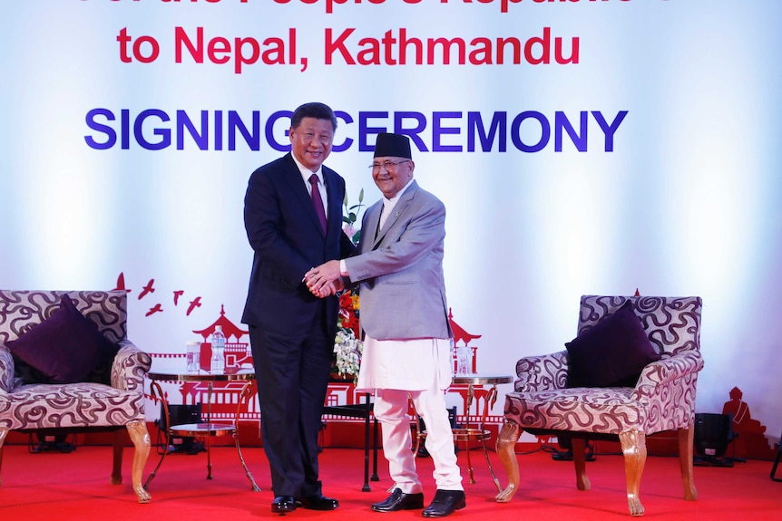 Chinese President Xi Jinping, left, and Nepalese Prime Minister Khadga Prasad Oli meet.