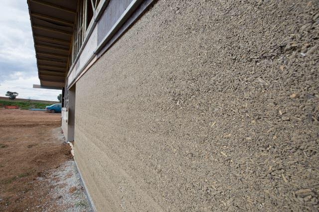 Shot of a house wall from the outside with fibres visible on the surface