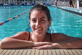 Sophie Bejek smiling at the camera in a swimming pool.