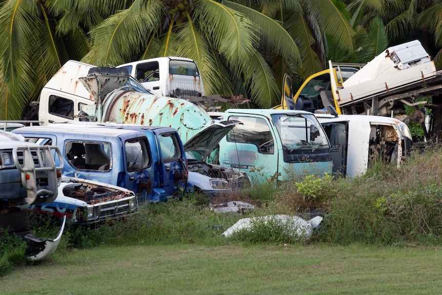 Old rusting car bodies stockpiled at the West Island recycling centre.