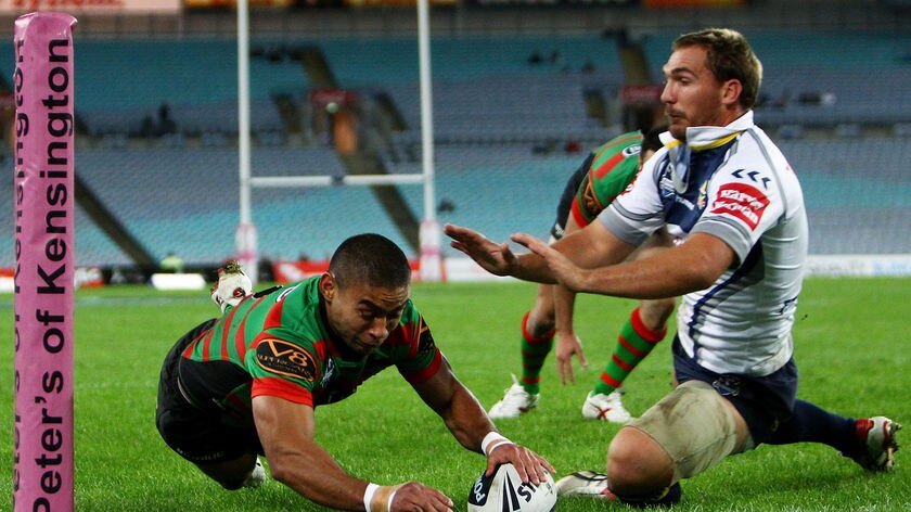 Rabbitohs rout: Nathan Merritt crosses for his first of a pair of tries for Souths.
