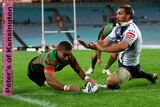 Rabbitohs rout: Nathan Merritt crosses for his first of a pair of tries for Souths.