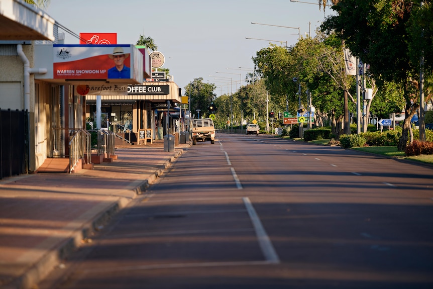 A photo of a main street with no cars driving on it.