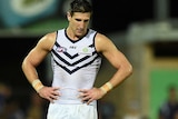 Matthew Pavlich looks downcast while standing on the pitch at TIO Stadium, Darwin.