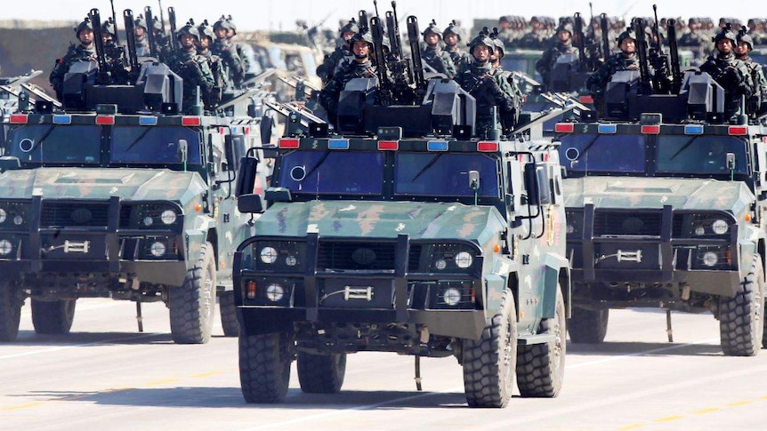 Soldiers of China's People's Liberation Army (PLA) take part in a military parade.