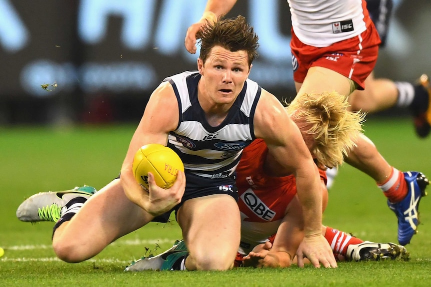 Patrick Dangerfield is tackled