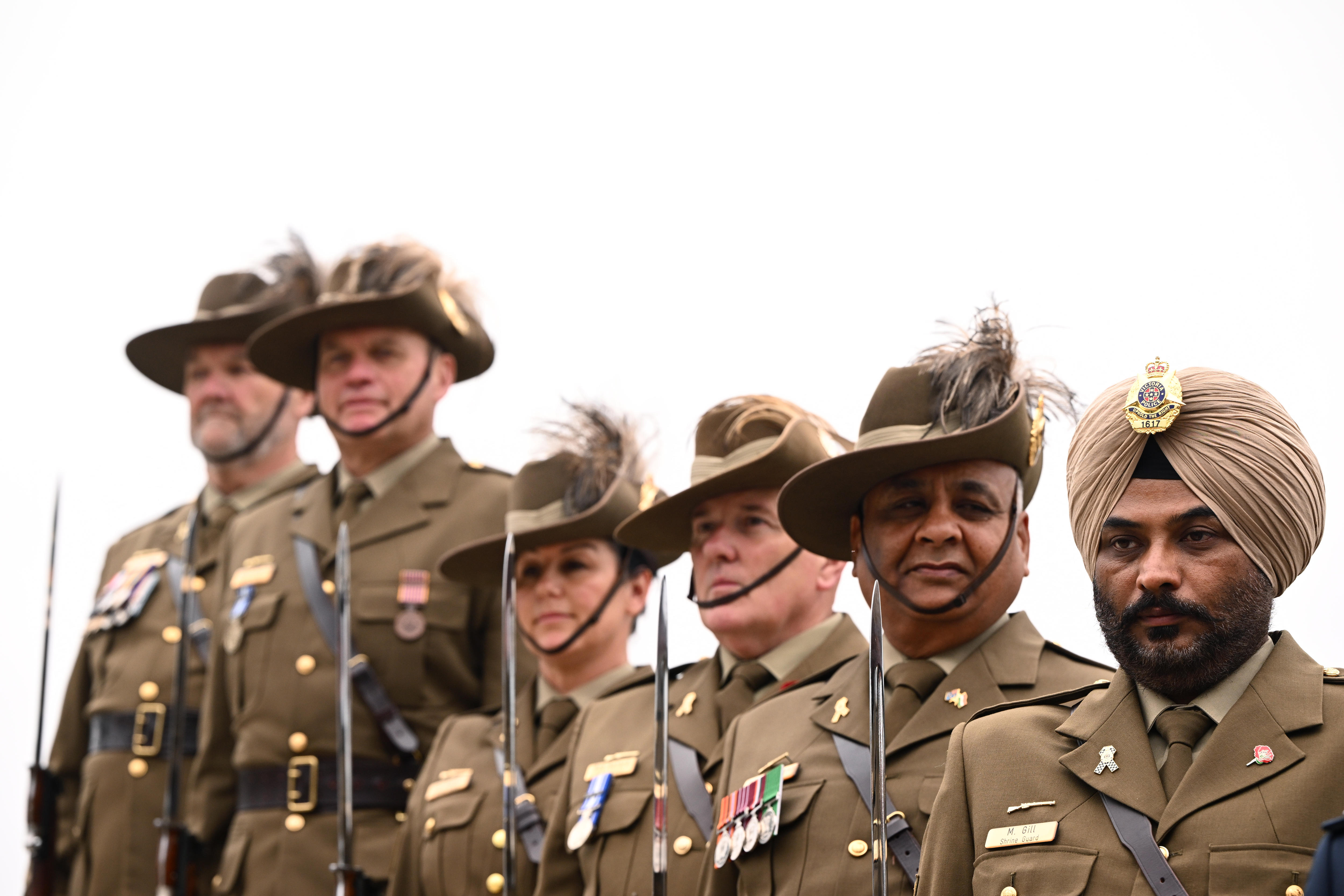 Australian defence personnel standing in a line 