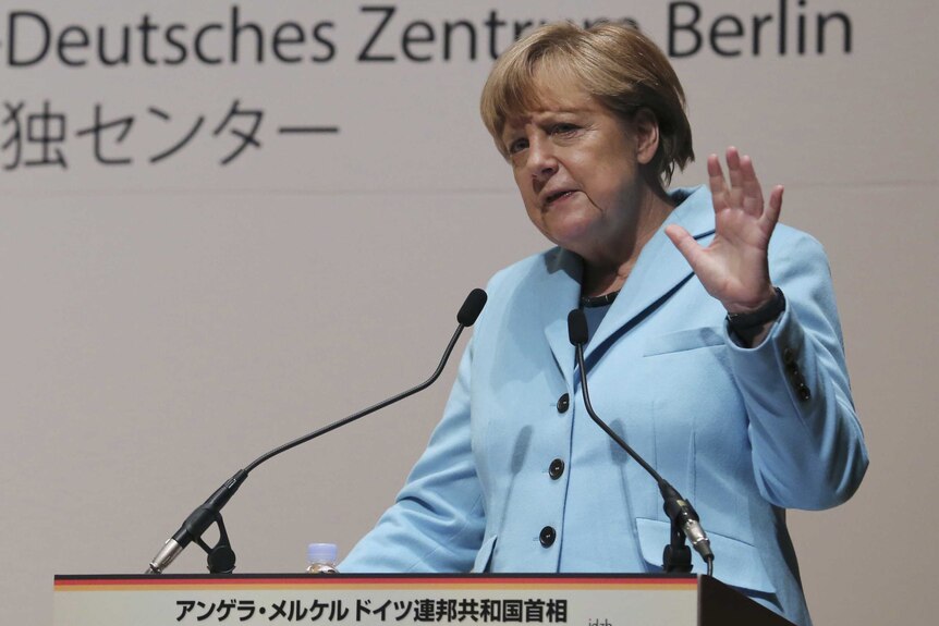 German chancellor Angela Merkel speaks at Japanese newspaper Asahi Shimbun in Tokyo