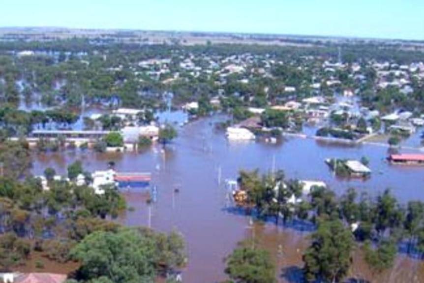 A flooded town, as viewed from a helicopter.