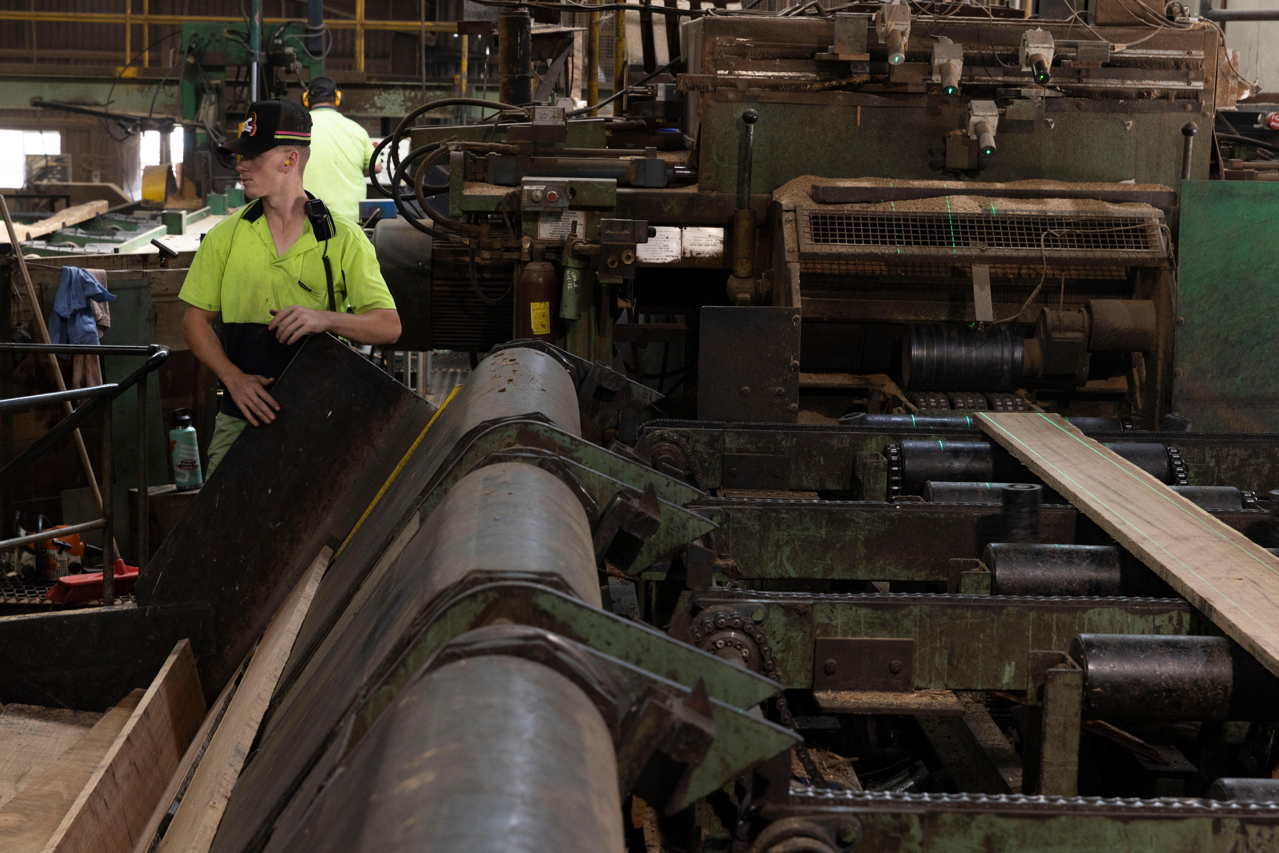 A man working in a timber factory.