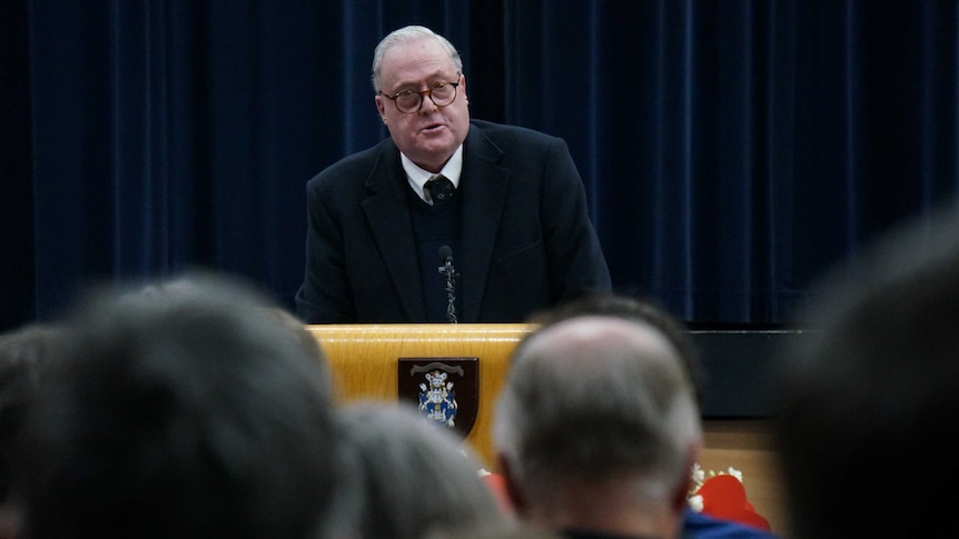 Father Gregory Brett of the Vincentians delivers an apology for historical sexual abuse at St Stanislaus College.
