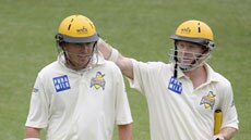 Marcus North and Chris Rogers congratulate each other during their 459-run stand