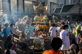 People pray at the Erawan shrine in Bangkok