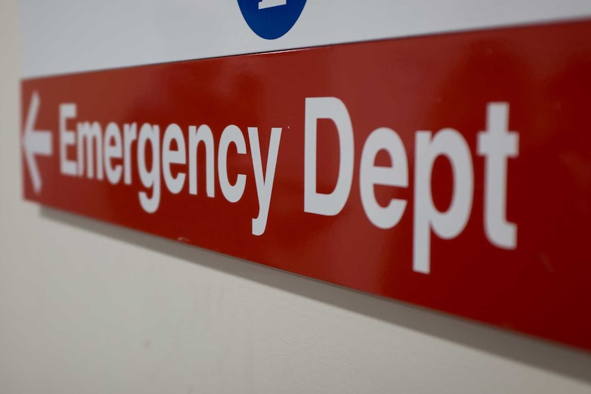 A photo of a red hospital emergency sign.