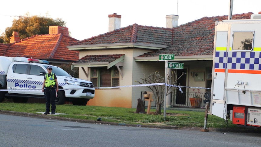 Police guard a house on Coode Street in Bedford, Perth's north-eastern suburbs, where five people were found dead.