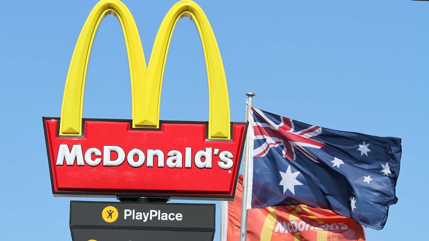 McDonald's golden arches with McDonald's flag and Australian flag