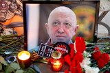 A view shows a portrait of Wagner mercenary chief Yevgeny Prigozhin at a makeshift memorial.