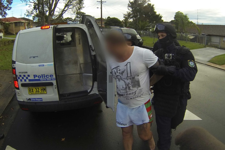Illawarra police arrest a man during raids on the NSW south coast.