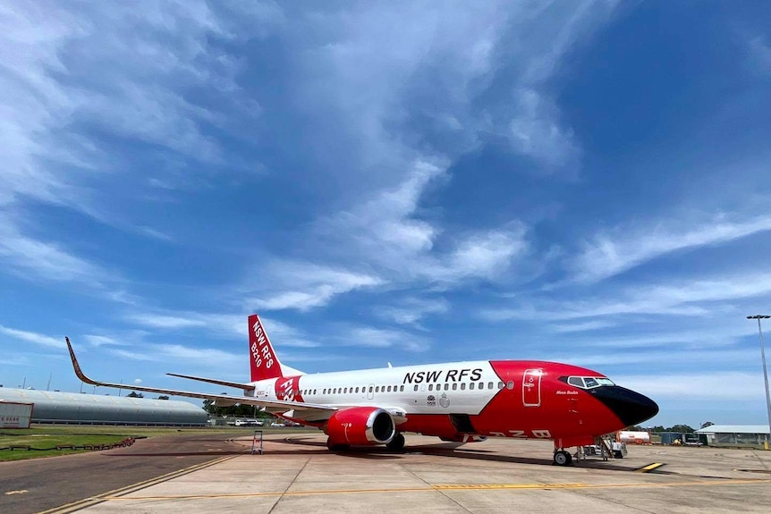 Plane parked on tarmac.