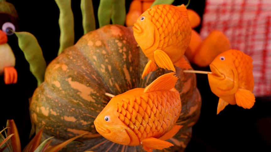 Fish carved from a pumpkin.