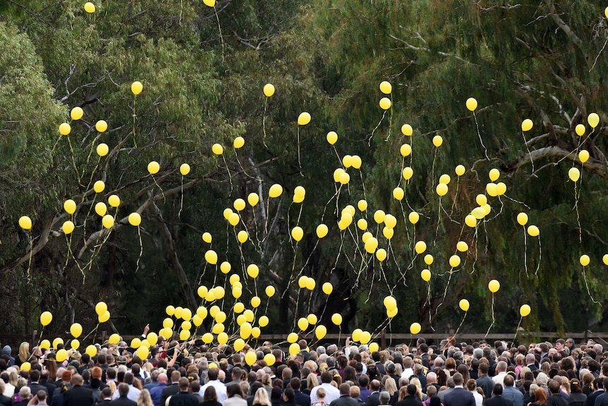 Yellow balloons released at Stephanie Scott funeral