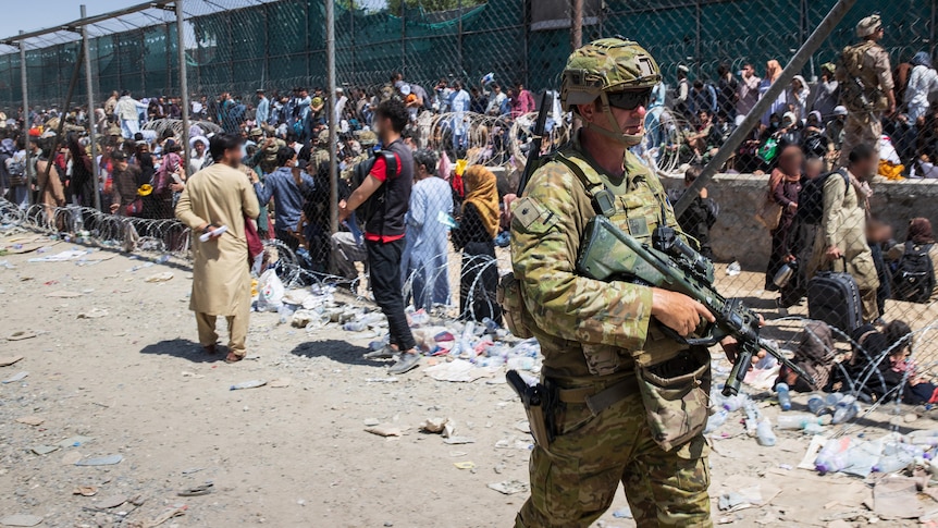 Australian troops had been helping citizens through Kabul airport's Abbey Gate hours before bombing