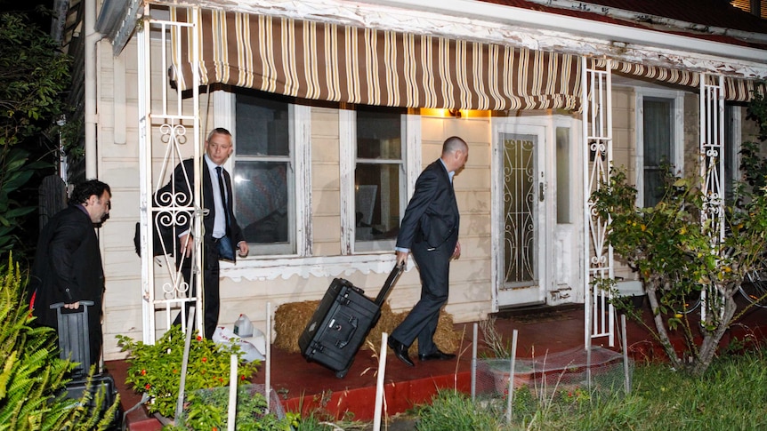 Authorities enter home of Labor staffer