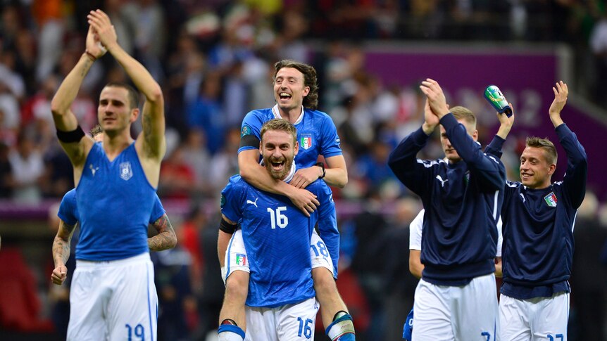 Italian players celebrate their win over Germany in Euro 2012 semi-final.