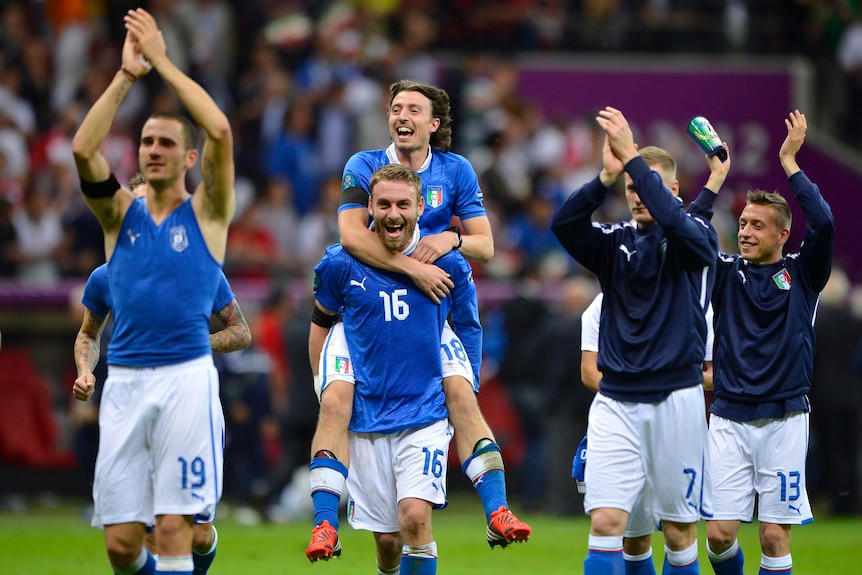 Italian players celebrate their win over Germany in Euro 2012 semi-final.