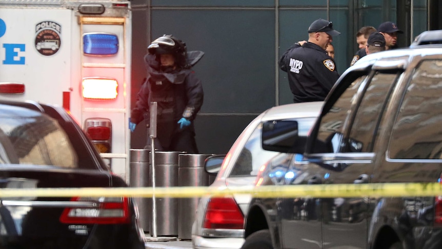 A man wearing a bomb proof clothing outside the Time Warner Centre