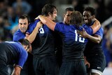 France players celebrate after winning the semi-final match against a 14-man Welsh outfit at Eden Park.