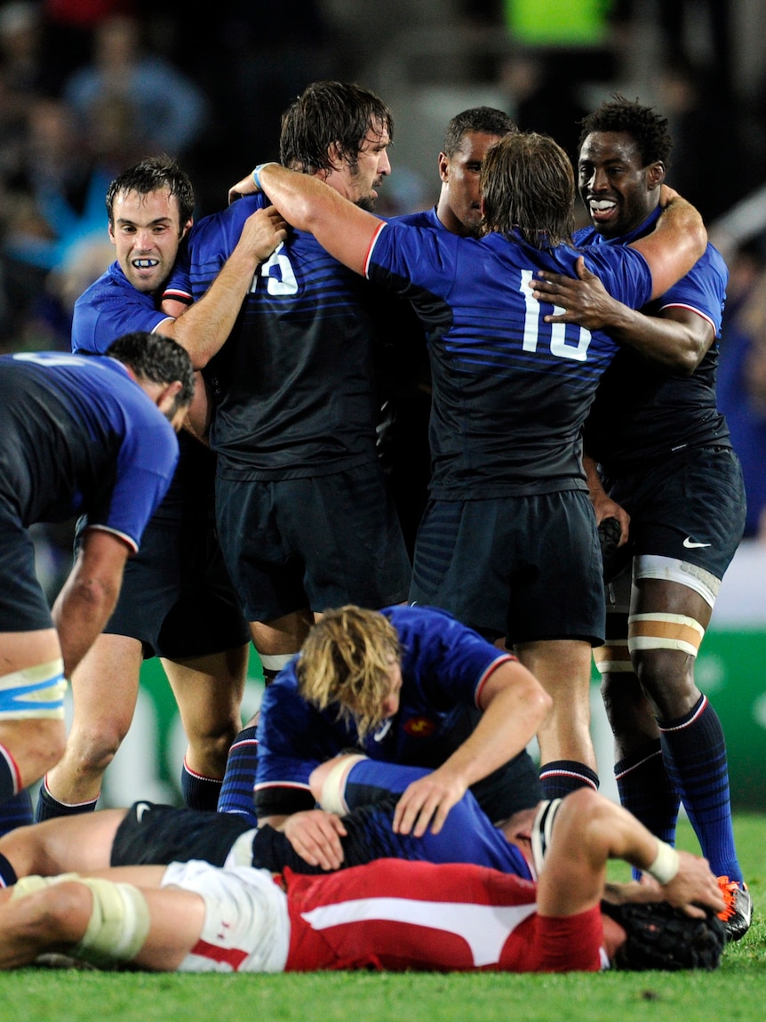 France players celebrate after winning the semi-final match against a 14-man Welsh outfit at Eden Park.