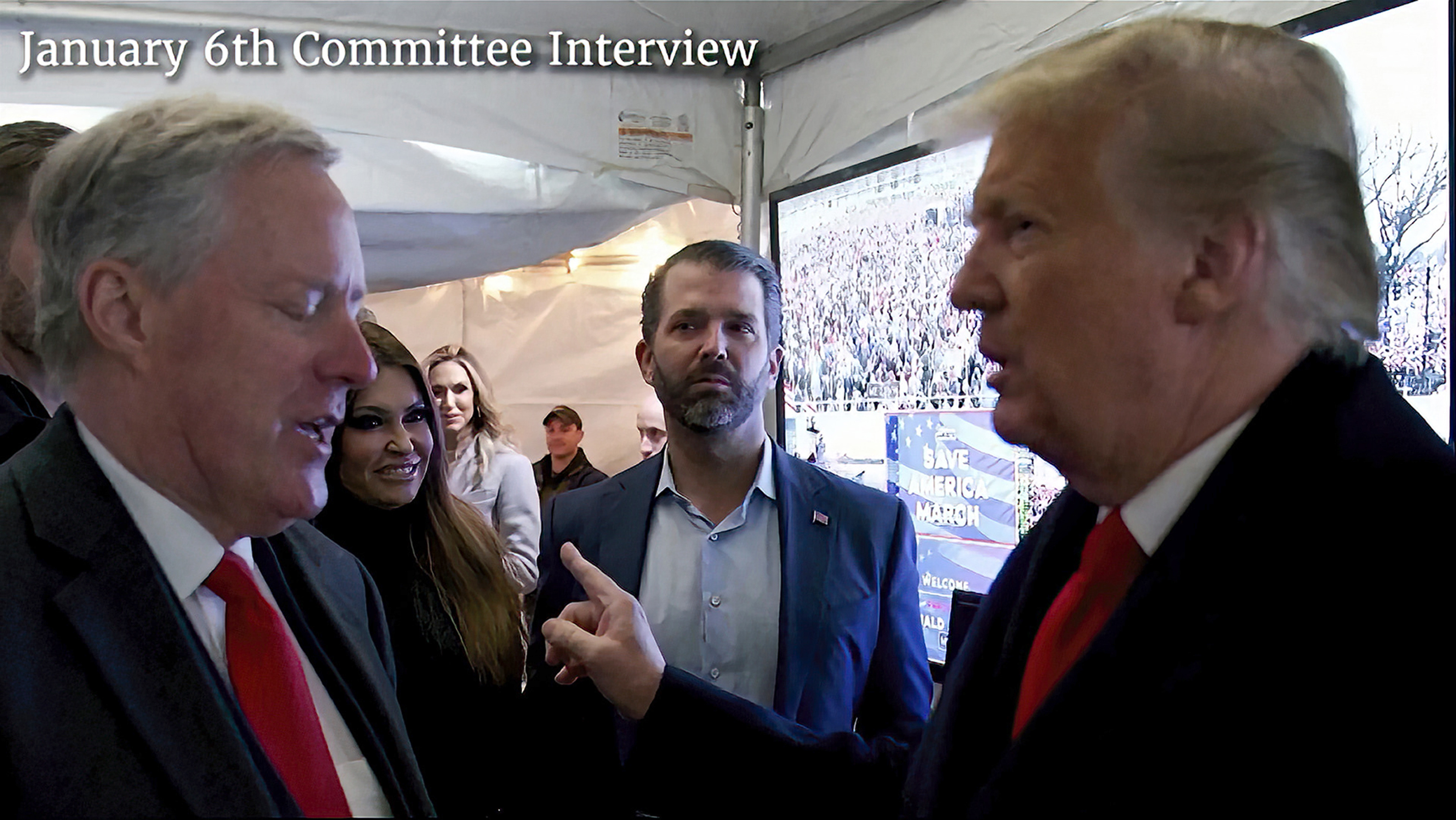 Donald Trump points his finger while talking to Mark Meadows