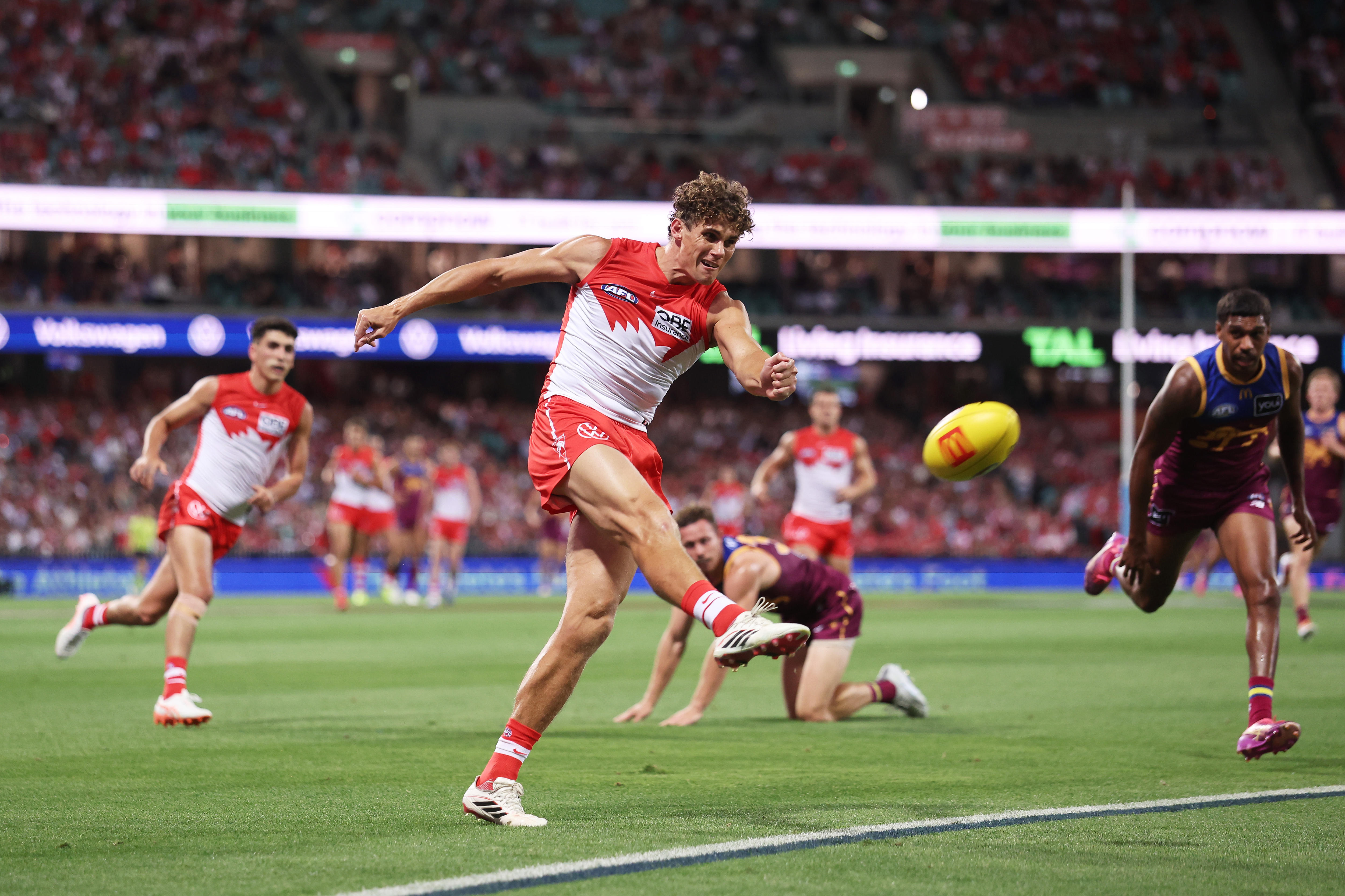 Charlie Curnow kicks for goal from outside 50m.